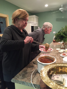 Pam serves chili con carne